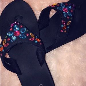Colorful gem flip flops with a one inch heel